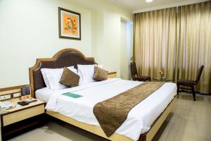 Hotel Tip Top Plaza客房内的一张或多张床位