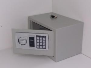 a white microwave with a drawer and a button at Holiday house Lual in Agerola