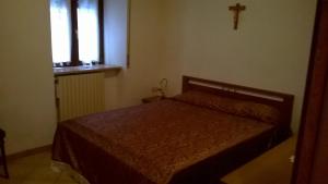 Posteľ alebo postele v izbe v ubytovaní Angolo Tranquillo