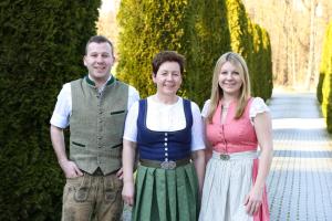 a man and a woman posing for a picture at Spirklhof in Bodenkirchen