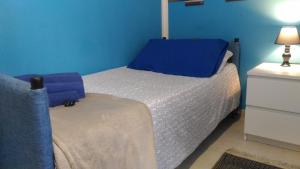 A bed or beds in a room at B&B Pian del Lago