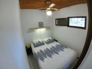 Postel nebo postele na pokoji v ubytování Domaine de la Testa