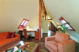 Posezení v ubytování Hotel Ambassador
