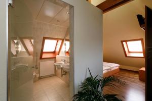 Postel nebo postele na pokoji v ubytování Hotel Ambassador