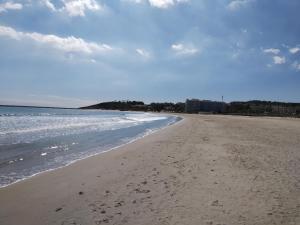 Ein Strand an oder in der Nähe der Ferienwohnung