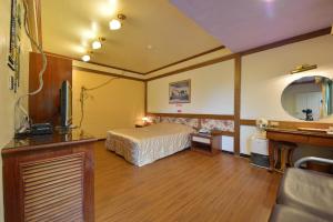 Легло или легла в стая в Shinmingshan Holiday Inn