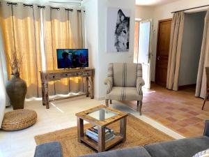 TV a/nebo společenská místnost v ubytování B&B La Badelle