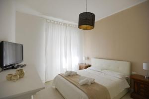 B&B Alghero 82客房内的一张或多张床位
