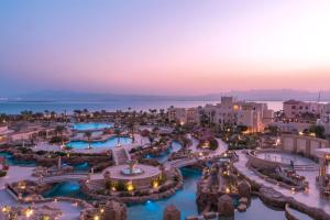 an aerial view of a resort at night at Kempinski Hotel Soma Bay in Hurghada
