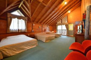 Katil atau katil-katil dalam bilik di Shinmingshan Holiday Inn