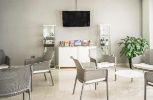 TV a/nebo společenská místnost v ubytování Hotel Cristina