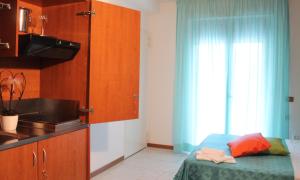 Kuchyň nebo kuchyňský kout v ubytování Hotel Villa Truentum