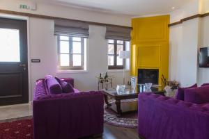 A television and/or entertainment centre at Abi Luxury Villas
