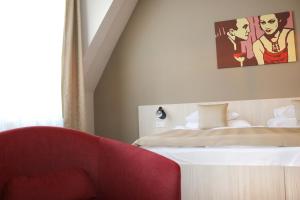 Postel nebo postele na pokoji v ubytování 1.Republic Hotel