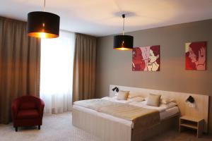 Postel nebo postele na pokoji v ubytování 1.Republic Hotel