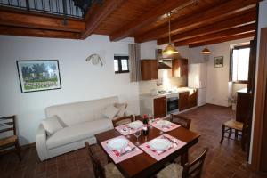 A seating area at Serravalle Relais & Country Villa with private pool - Esclusive use