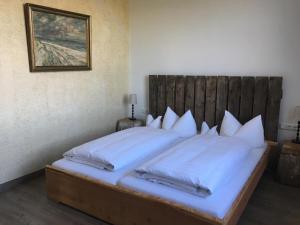 Postel nebo postele na pokoji v ubytování Hotel Fresena