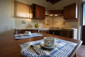 A kitchen or kitchenette at Serravalle Relais & Country Villa with private pool - Esclusive use
