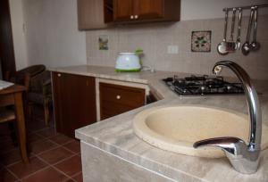 A kitchen or kitchenette at Serravalle Relais & Country Villa with private pool - Esclusive use