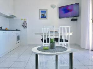 Kuchyň nebo kuchyňský kout v ubytování Beach Apartments Tina
