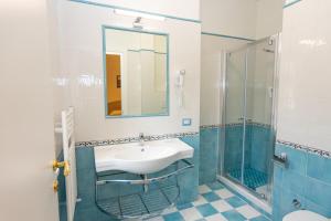 A bathroom at Ambra Sorrento Suites Short Rent