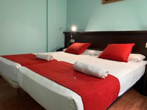 Cama o camas de una habitación en Hostal Hotil Coruña Centro