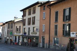 a row of buildings on a city street at B&B Michelina in Castiglione dʼIntelvi +24 photos