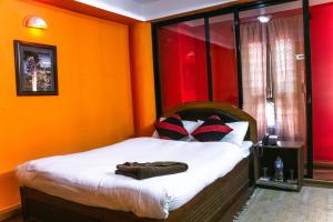 Cama o camas de una habitación en Siddhi Home & Restaurant