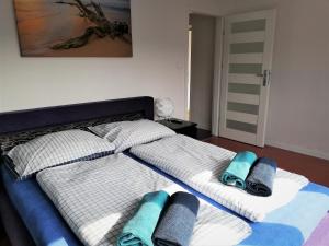 Posteľ alebo postele v izbe v ubytovaní Apartament Morski Integro