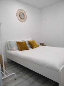 מיטה או מיטות בחדר ב-Casas do Pedro T3
