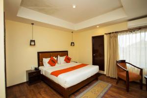 Krevet ili kreveti u jedinici u okviru objekta Hotel Jay Suites