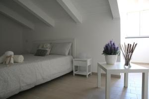 Posteľ alebo postele v izbe v ubytovaní Rosy House - Hospitality