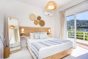 Postel nebo postele na pokoji v ubytování Euphoria Luxury apartment