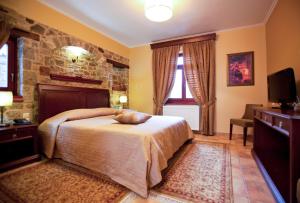 Postel nebo postele na pokoji v ubytování Amanites Guesthouse