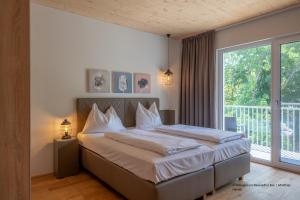 Postel nebo postele na pokoji v ubytování Hotel Katamaran