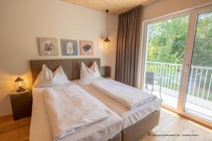 Postel nebo postele na pokoji v ubytování Hotel Katamaran