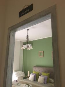 Posteľ alebo postele v izbe v ubytovaní Siracusa Vacanze