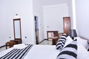 Voodi või voodid majutusasutuse skyresort toas