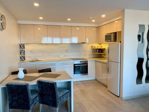 Kjøkken eller kjøkkenkrok på Arunes Apartments - Daukanto