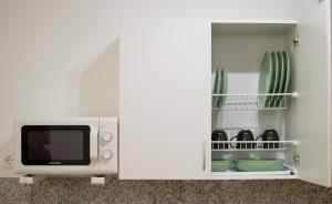 Kuchyň nebo kuchyňský kout v ubytování Apartamentos Océanos