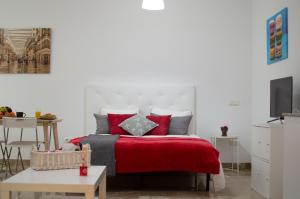TV a/nebo společenská místnost v ubytování Apartamentos Océanos