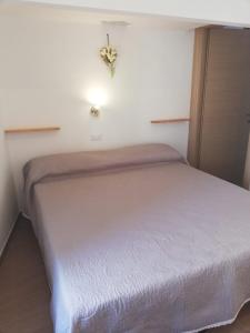 A bed or beds in a room at Il lago del Mugello B&B