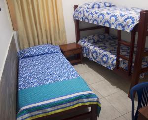 Postel nebo postele na pokoji v ubytování Hotel Real Pólux