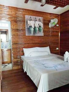 Postel nebo postele na pokoji v ubytování BING-VICE Tourist Inn