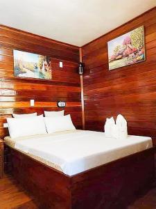 Postel nebo postele na pokoji v ubytování BING-VICE Tourist Inn