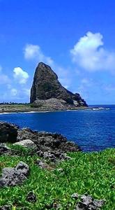an island in the middle of a body of water at 蘭嶼小島觀海旅宿 in Lanyu