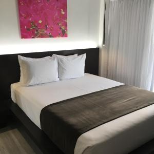Voodi või voodid majutusasutuse R Hotel Kingston toas
