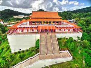 an overhead view of a building with an orange roof at Prima B&B Hostel in Sandakan