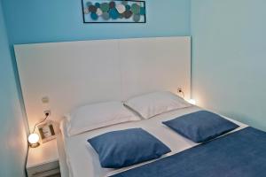 Ένα ή περισσότερα κρεβάτια σε δωμάτιο στο Josephine Rabac