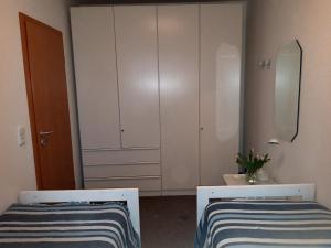 Ein Bett oder Betten in einem Zimmer der Unterkunft Eine schöne 3-Zimmer-Wohnung mit Ostsee-Zugang!